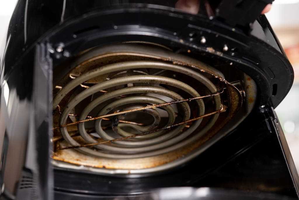 Not Cleaning The Air Fryer Regularly Causing Buildup Affects Performance